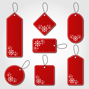 Red christmas tag collection with snowflake pattern and hangers. Sale promotion and gift card vectors in different shapes.
