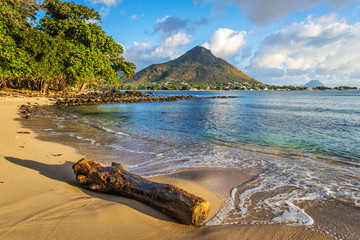 Rocky and sandy shore in Tamarin Bay, Mauritius - 95051527