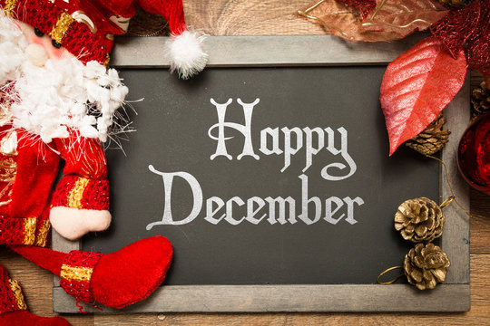 Blackboard with the text: Happy December in a christmas conceptual image