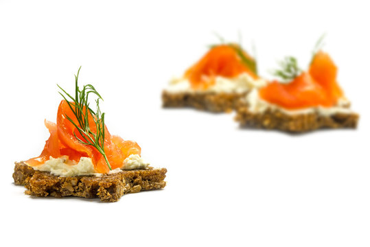 canapes  in star shape with smoked salmon for a christmas dinner