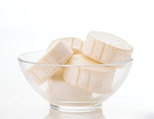 Lots of goat cheese in transparent bowl