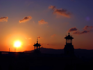 Fototapeta na wymiar Sunset over an old cupola in Barcelona