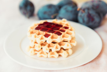 Belgian waffle with plum jam