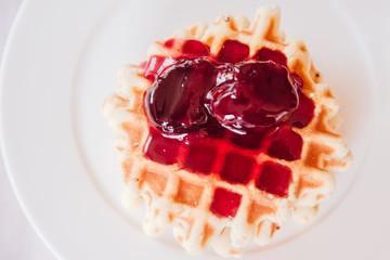 Belgian waffle with plum jam