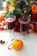 mulled wine with decorated christmas tree