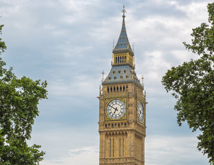 Detail shot of the Big Ben with trees, London, UK