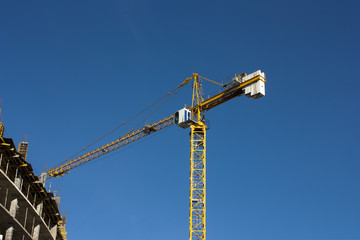 Fototapeta na wymiar Crane and construction