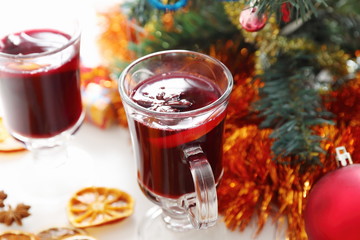 mulled wine with decorated christmas tree