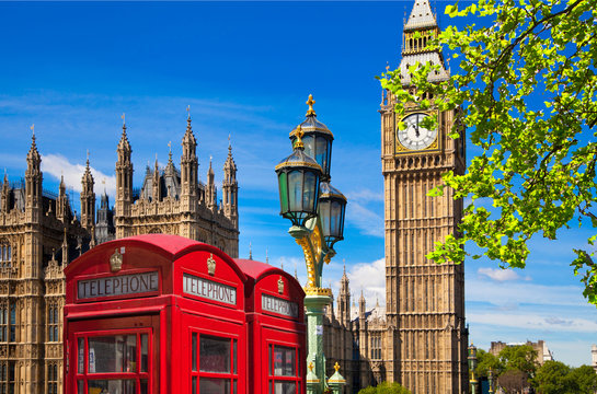 Fototapeta Red British telephone box in front of Big Ben, London