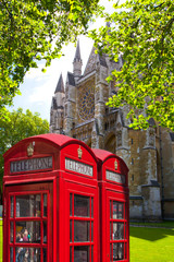 Fototapeta na wymiar Red British telephone box in front of Westminster cathedral, London