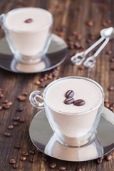 Coffee Panna cotta in a glass Cup with coffee beans.Toned image. Vintage style.selective focus.