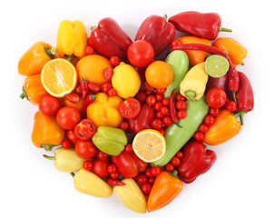 Naklejka na ściany i meble Heart-shaped close-up composition of various raw organic vegetables isolated on white
