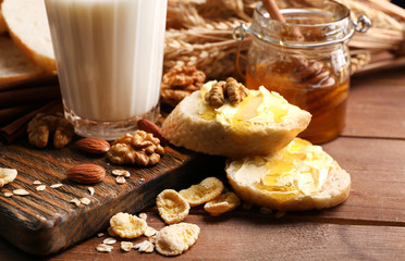 Healthy breakfast with bread, honey, nuts. Country breakfast concept