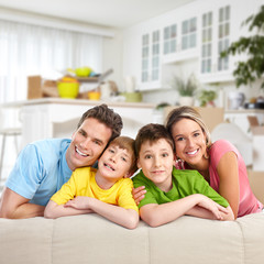 Obraz premium Happy family in a new house.
