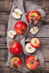 Fresh red apples on wooden background.selective focus.