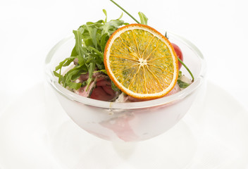 tomatoes and cheese on white plate in a restaurant