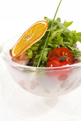 tomatoes and cheese on white plate in a restaurant