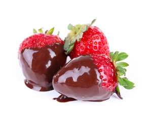 Three delicious strawberries dipped in chocolate isolated on white