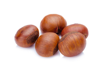 Fresh chestnuts isolated on white