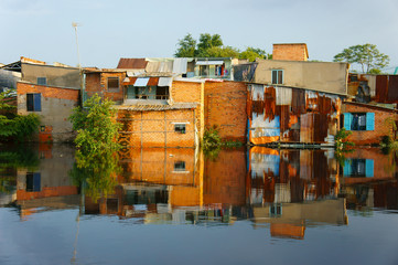 Fototapeta premium riverside downgrade house, brick wall, poor