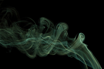 Movement of white smoke on black background