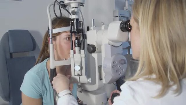 Female patient on medical attendance at the optometrist