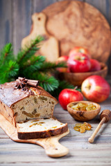 Apple, raisins and cinnamon cake with fresh apples, selective focus