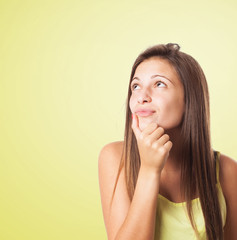 Fototapeta premium portrait of pretty young woman thinking about something