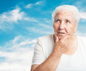 portrait of elder woman thinking about something