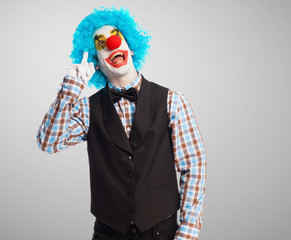 portrait of a funny clown over white