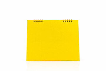 Yellow blank paper desk spiral calendar.