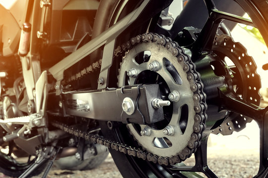 Fototapeta rear chain and sprocket of motorcycle wheel