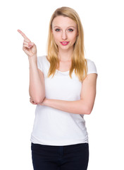 Caucasian young woman with finger point up