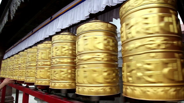 Golden prayer wheels