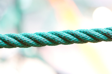 Close up of green dirty rope.