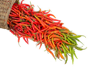 Colorful chillies with the basket on white background