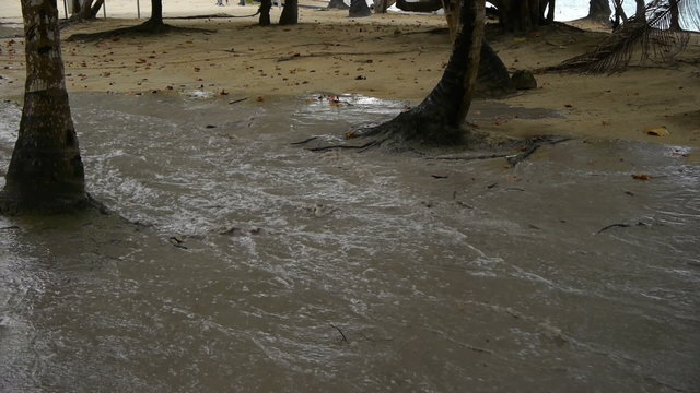 Yellow Jeep Drives Through Deep Puddle In Caribbean