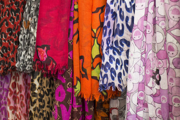 Colorful scarfs hanging in the market