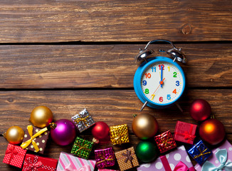 alarm clock and christmas baubles