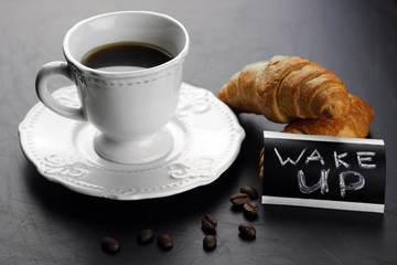 Morning coffee cup croissant