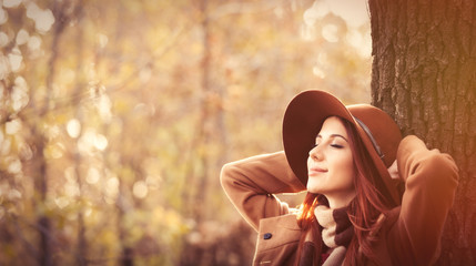 Woman in autumn park
