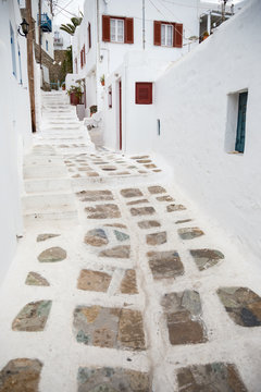 Fototapeta Traditional white ainted alley at Mykonos town, Greece