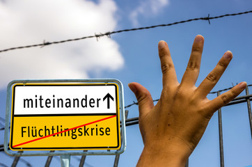 Ortstafel miteinander Flüchtlingskrise