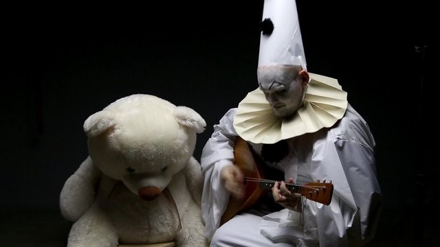 Piero playing on balalaika