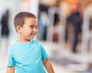 portrait of a little boy with happy gesture