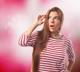 Fototapeta premium portrait of a worried young woman with a pensive gesture