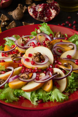 Fresh fruit salad with persimmons and garnet