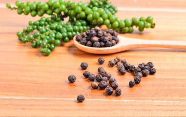 Black pepper on white background