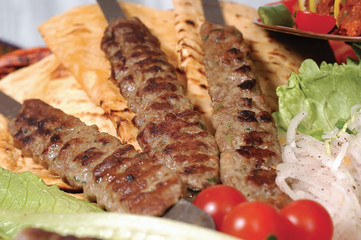 traditional turkish sish kebab and pittas on the table