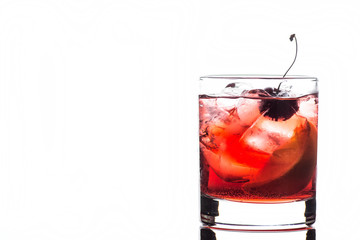 Old fashioned cocktail on white wooden background
